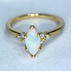 Marquise Opal and Canadian Diamond Ring- 0.12ct TDW