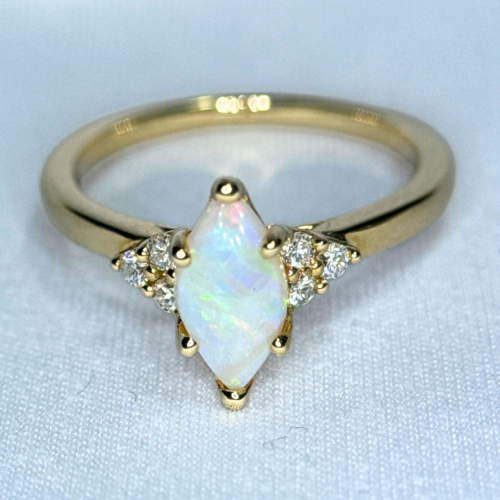 Marquise Opal and Canadian Diamond Ring- 0.12ct TDW