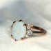 Oval Opal and Canadian Diamond Ring- 0.32ct TDW