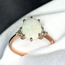 Oval Opal and Canadian Diamond Ring- 0.32ct TDW